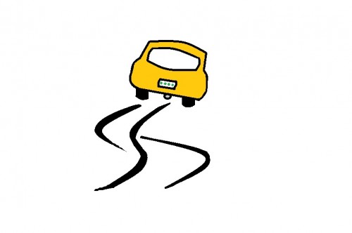 蛇行する車